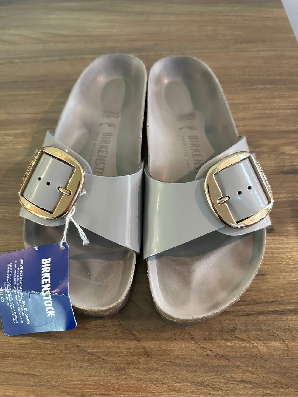 Birkenstock Madrid Patent Slides in Light Gray with Gold Buckles